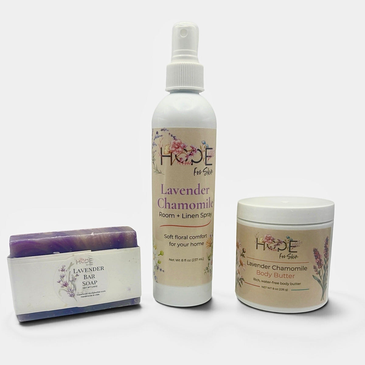 The Lavender Chamomile Moment self-care set with room and linen spray, lavender bar soap, and body butter