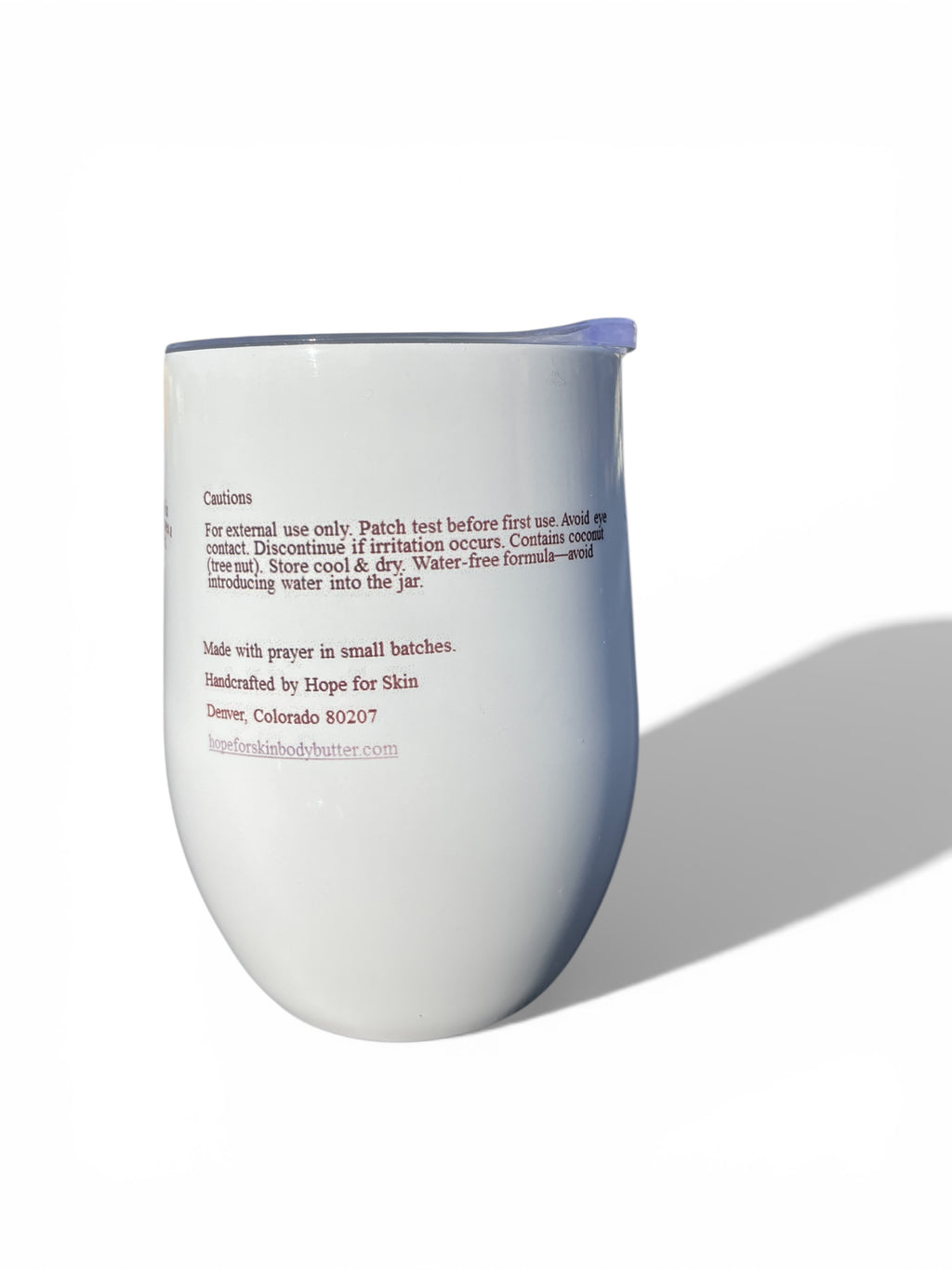 White container with text on a white background. Hope for skin wine glass Cautions and Contact information