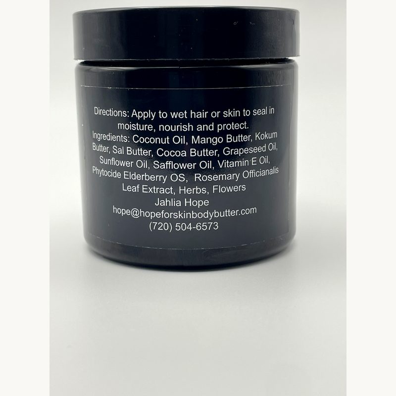 Black jar with white text on a gray background