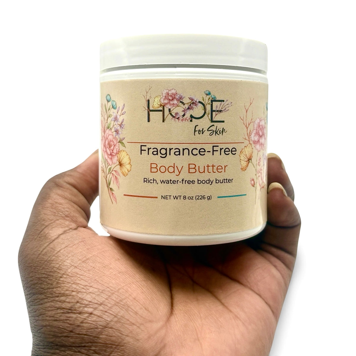 Hope For Skin Fragrance-Free Body Butter 8 oz held in hand